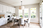 Inspiration for a transitional dark wood floor and brown floor kitchen/dining room combo remodel in San Diego with gray walls