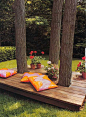 Great way to cover up exposed roots and create extra seating in the yard.