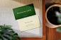 Clean minimal business card mockup on long chair background with plants foreground