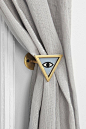 Magical Thinking Triangle-Eye Curtain Tie-Back #urbanoutfitters