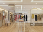 Interior of a contemporary fashionable clothing boutique_创意图片