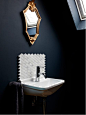 Inspiration for a victorian white tile powder room remodel in London with black walls and a wall-mount sink