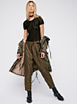 Free People Guy Sequin Pant : Guy Sequin Pant | Eye-catching sequin pants with a cute cropped fit and a relaxed feel. Front has a wrapped design at the waist with an adjustable tie and snap button closures. Side pockets. Lined with a super stretchy fabric