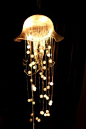 Jellyfish Chandelier by contemporarychandeliers: A bespoke creation, this jellyfish measures around 2 metres long, and has two lighting circuits. The primary circuit lights up the bowl and the acrylic spheres via fibre optics, the second lights up the gla