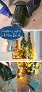 Display Christmas lights in a whole new, non-traditional way this year - in wine bottles! An LED light string can transform the wine bottle display into a lasting and useful memento!