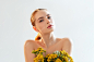 Natural cosmetology herbal therapy portrait of woman with perfect skin nude makeup bare shoulders wild flowers isolated on light white copy space background beauty wellness ayurveda dermatology