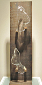 Siblime, 2013 by Simon Maberley Blown & cold worked glass, wood 82 x 22cm