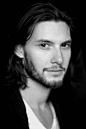 A black and white photo of Ben Barnes.