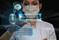 Female medical doctor working with virtual interface. Modern medical technologies concept