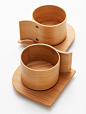 Stunningly beautiful wooden Alpha cups & saucers by designer Yukio Hashimoto. The pieces are hand crafted using the traditional Japanese craft technique of "wappa" or wood bending, where wooden boards are bent in hot water, creating beautifu