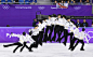 Composite photo shows Japanese figure skater Yuzuru Hanyu executing a quad salchow in his free skate at the Pyeongchang Winter Olympics in Gangneung...