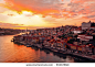 stock photo : Panorama old city Porto at river Duoro,with Port transporting boats at sunset,  Oporto, Portugal