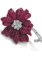 A mystery-set ruby Magnolia brooch by Van Cleef 