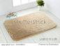 brown bathroom carpet on white wooden floor