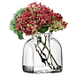 Buy LSA International Umberto Vase Clear | Amara : Add unique and rustic character to your home with this Umberto clear vase from LSA International. Hand crafted from mouth-blown glass, this vase features gorgeous thick walls and a jar-like neck sculp