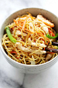 Chow Mein in a bowl, with a pair of chopsticks, ready to be served.