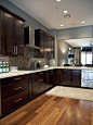 Espresso cabinets and grey walls from HGTV Design Star Britany's portfolio. Gorgeous!