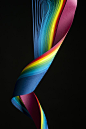 Curves of rainbow colored paper