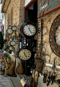 vintage clocks on the streets of Guadalest, Spain