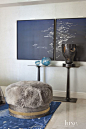 Another guest bedroom gets a hint of texture through Azadeh Shladovsky’s ottoman for Jean de Merry, nestled atop a rug by Fedora Design. A bronze lamp by Jacques Jarrige, from Valerie Goodman Gallery in New York, perches on a Patrick Naggar table. Art by 