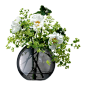 Buy LSA International Polka Vase Sheer Zinc - 11cm | Amara : Display small sprigs to large headed floral bouquets in style with LSA International’s Polka vase range in zinc. Available in two sizes, this zinc grey hand-painted vase has been mouth-blown by 