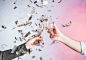 Hand toasting with confetti Free Photo