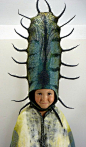 Gladys Paulus' felt headdresses would take any costume over the top.