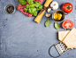 Ingredients for cooking pasta Bolognese. Spaghetti, Parmesan cheese,  tomatoes, metal grater,...