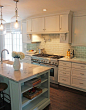 Gorgeous kitchen by Nick & Wendy Guehne of Guehne-Made, Kansas City. Island is painted Sherwin-Williams Tidewater. Featured on House of Turquoise blog.: