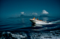 A motorboat carries tourists to fishing grounds off Tahiti, July 1962.Photograph by Luis Marden, National Geographic 一个摩托艇携带游客渔场塔希提岛,1962年7月。