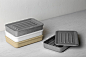 landscape organizing boxes hold tabletop gadgets | Designboom Shop : The LANDSCAPE organizing boxes introduce a collection of storage cases specified for all tabletop gadgets and/or accessories. Function follows form because each box lid is fitted with a