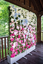 A flower wall is the perfect backdrop for pictures. Photo | Sara Reeve: 