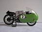 Moto Guzzi V8 with green dustbin fairing