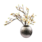 You'll certainly make a bold statement by displaying these magnolias. Standing strong and tall in a fashionable titanium vase, these magnolias are sized to delight, with their fluffy blooms resting atop a bed of branches.: 