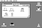 The early Macintosh desktop metaphor: Icons scattered on the desktop depict documents and functions, which can be selected and accessed (as System Disk in the example).