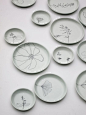 Hand casted and hand drawn plates by Elke van den Berg & Maartje van den Noort