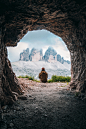 A guy admiring a beautiful mountain landscape