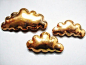 Golden cloud porcelain wall pillows.