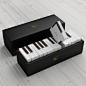Piano cake packaging - MARAIS : Gift packaging for cakes (financier). The picture shows the 15-cake size box (Two octaves).