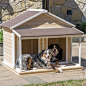Two Dog Dog House with Covered Porch. Suitable for two Small or Medium Dogs. Comes with center divider for use or removal. Asphalt Roof Cream color