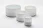 Bowls set <em>Light of Dot Cylinder</em>. White porcelain, 19.5 × 10 cm.