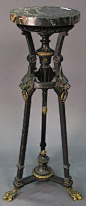 Victorian, Etruscan Revival, plant stand, ebonized and gilt wood, marble, ormolu feet, ringed lion mask ornamentation
