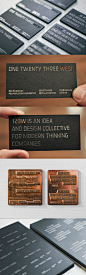 clever-laser-cut-logo-on-a-silver-foiled-black-business-card