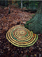 British artist Tim Pugh makes elaborate artwork on site out of sticks, leaves, pine cones, and other found materials in nature. It sort of reminds me of Tibetan Buddhist sand paintings and Robert Smithson’s Spiral Jetty. 

Original Article