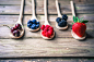 Berries on wooden rustic background