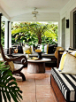 Simple black and white strips add classic style to this relaxing patio.: 