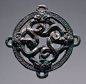 Chinese, Eastern Zhou dynasty, 770–256 B.C., Warring States period, ca. 470–221 B.C.                                Openwork roundel with entwined dragons, 5th century B.C.                Bronze with traces of gilding: