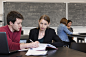 Caucasian student and teacher studying in classroom : Caucasian student and teacher studying in classroom