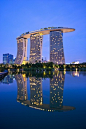 Marina Bay Sands in Singapore - Interesting shape: An Integrated Resort fronting Marina Bay in Singapore. Developed by Las Vegas Sands, it is billed as the world's most expensive standalone casino property at 8 billion dollars, including cost of the prime