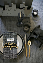 gotham city halloween party // set the table with costumes all ready for guests #batman #gotham #halloween: